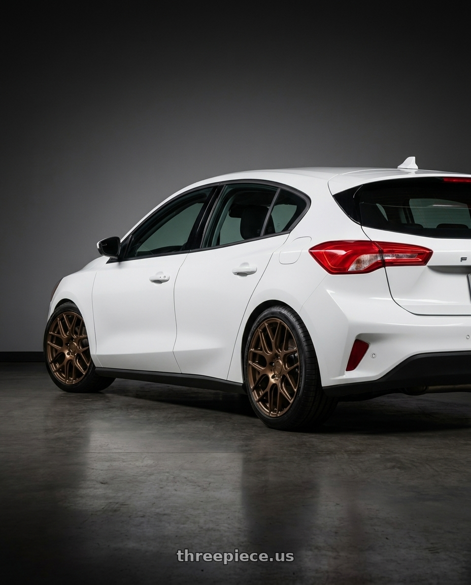 2020 Ford Focus with MRR FS1 5x112 18x8.5  +25 Gloss Bronze wheels rear three quarter view square tires