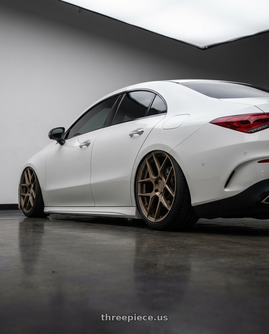 2023 Mercedes-Benz CLA C118 with Aodhan AFF2 5x112 19x8.5+35 Matte Bronze wheels rear three quarter view slight stretch tires