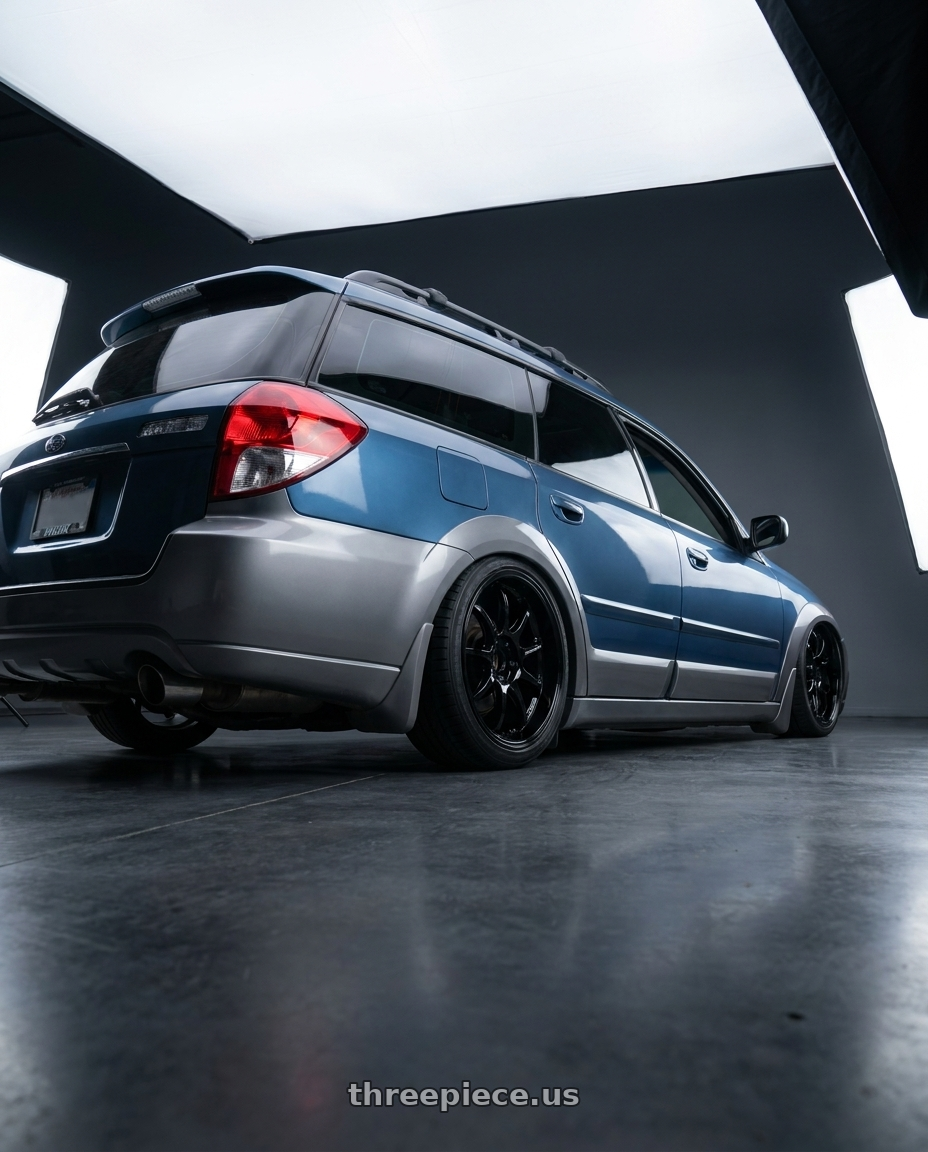 2008 Subaru Outback 2 5i with Work Emotion D9r 5x100 18x8.5 +38 Black wheels rear three quarter view square tires