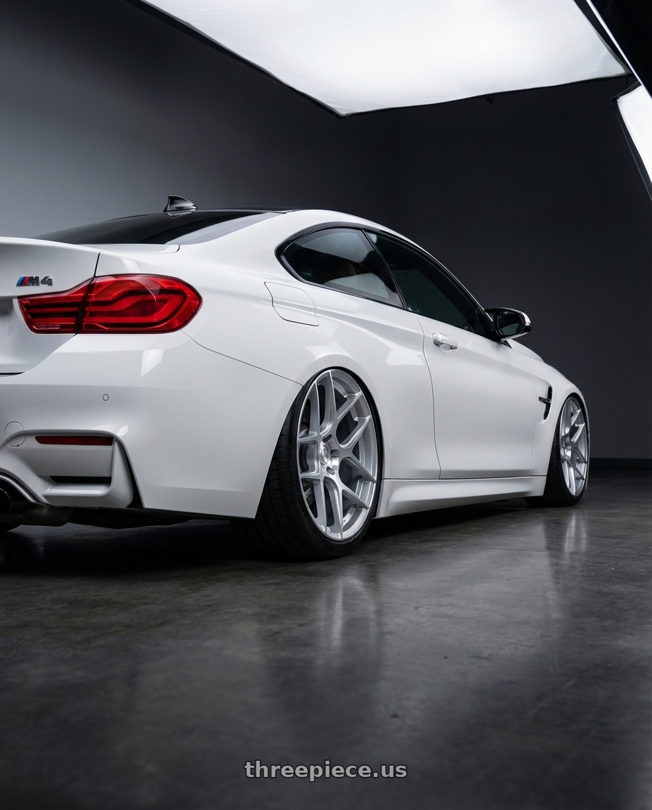 2018 BMW M4 F82 with Aodhan AFF2 5x120 19x9.5+35 Gloss Silver Machined Face wheels rear three quarter view slight stretch tires