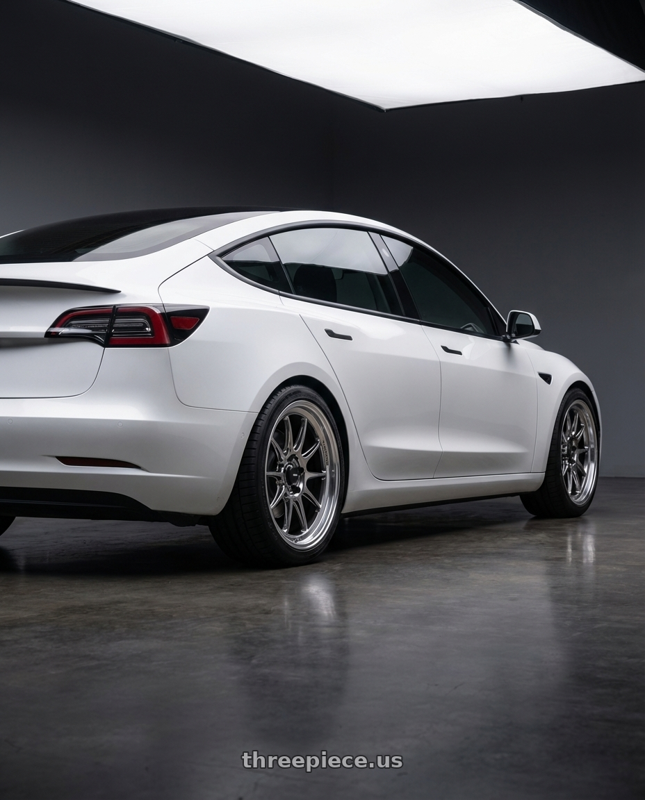 2023 Tesla Model 3 with Konig Countergram 5x114.3 19x9.5+25 Hyper Chrome / Machined Lip wheels rear three quarter view square tires