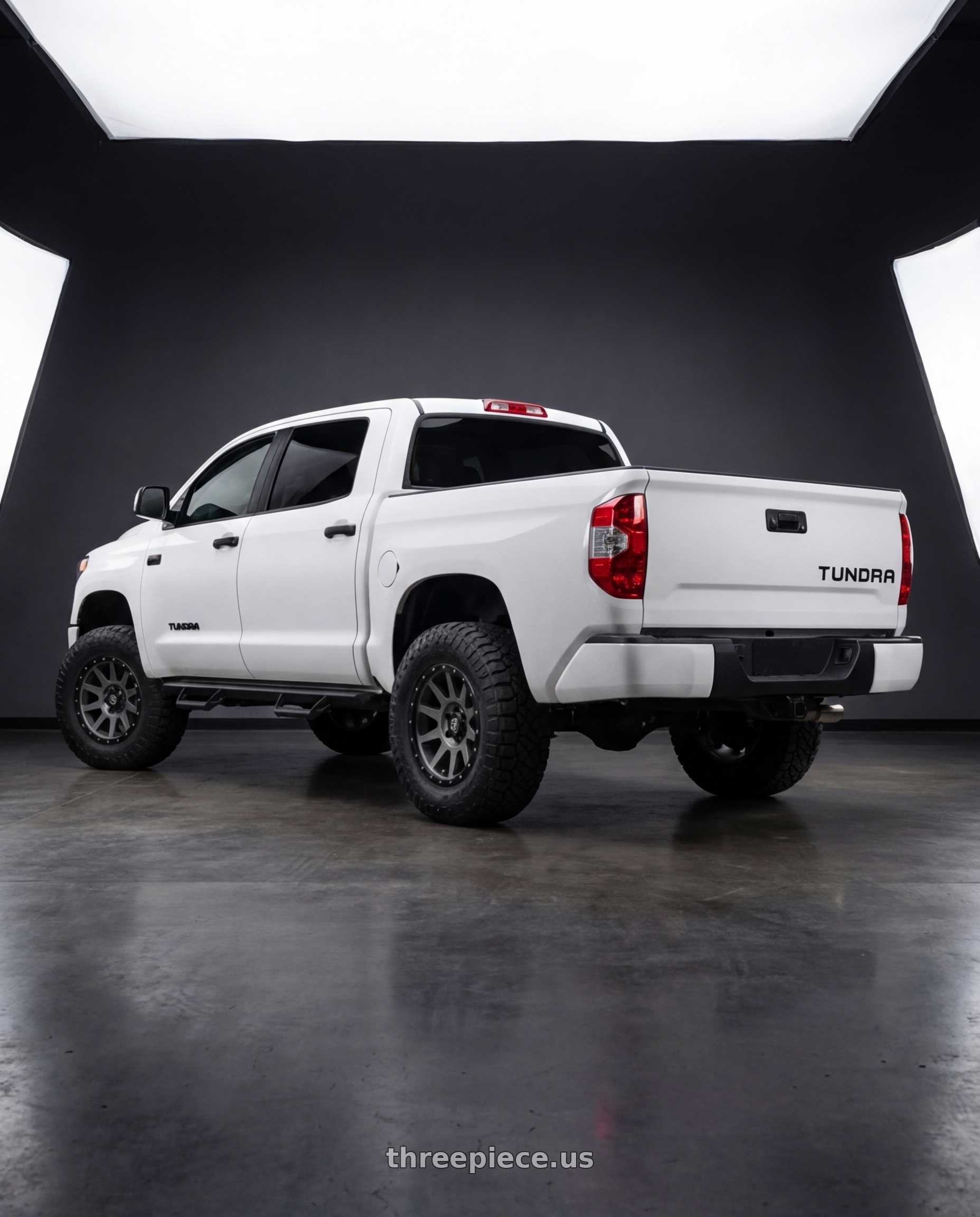 2021 Toyota tundra with Icon Alloys COMPRESSION 5x150 17x8.5+25 TITANIUM wheels rear three quarter view meaty tires