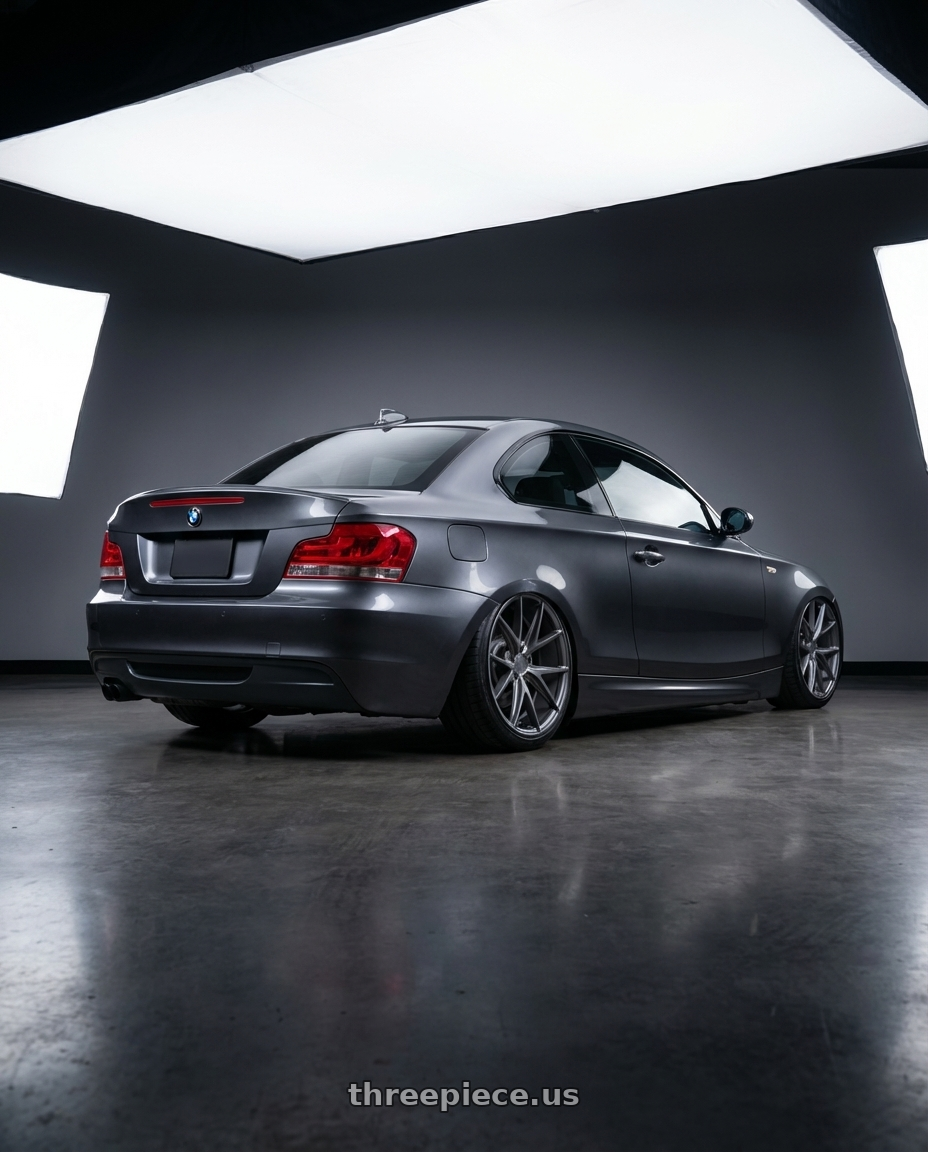 2012 BMW 1 Series E82 with Niche 1PC M116 MISANO 5X120 19X8.5 +35 MATTE GUN METAL wheels rear three quarter view slight stretch tires