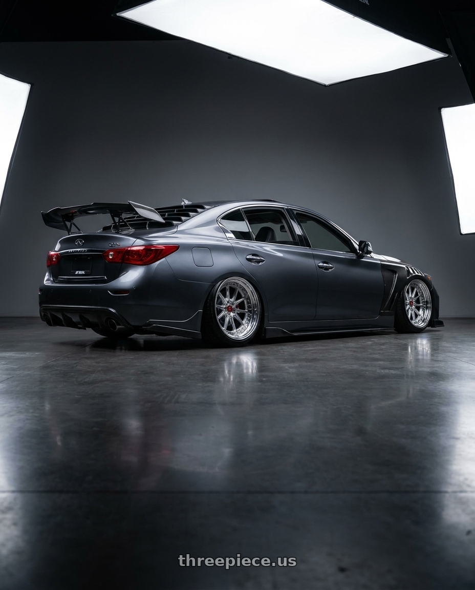 2016 Infiniti q50s with Work Emitz Chrome 5x114.3 19x10.5 +38 wheels rear three quarter view slight stretch tires