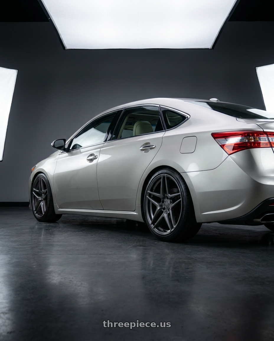 2013 toyota avalon with Kansei K15G Astro 5x114.3 19x8.5 35 Gunmetal wheels rear three quarter view slight stretch tires