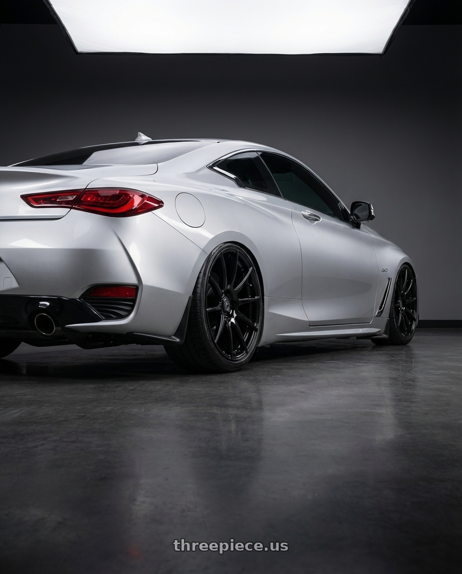 2020 Infiniti Q60 with Forgestar CF10 5x114.3 20x9.5 +29 Gloss Black wheels rear three quarter view slight stretch tires