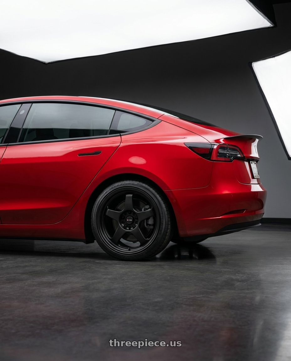 2022 Tesla Model 3 Performance with Vors SP1 5x100/5x114.3 17x8  +35 All Matte Black wheels rear three quarter view square tires
