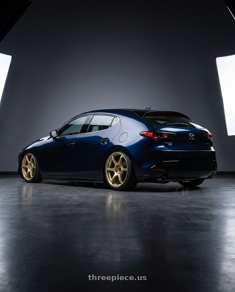 2023 Mazda Mazda3 Turbo with Advan RGIII 5x114.3 18x8.0+45 Gold wheels rear three quarter view slight stretch tires