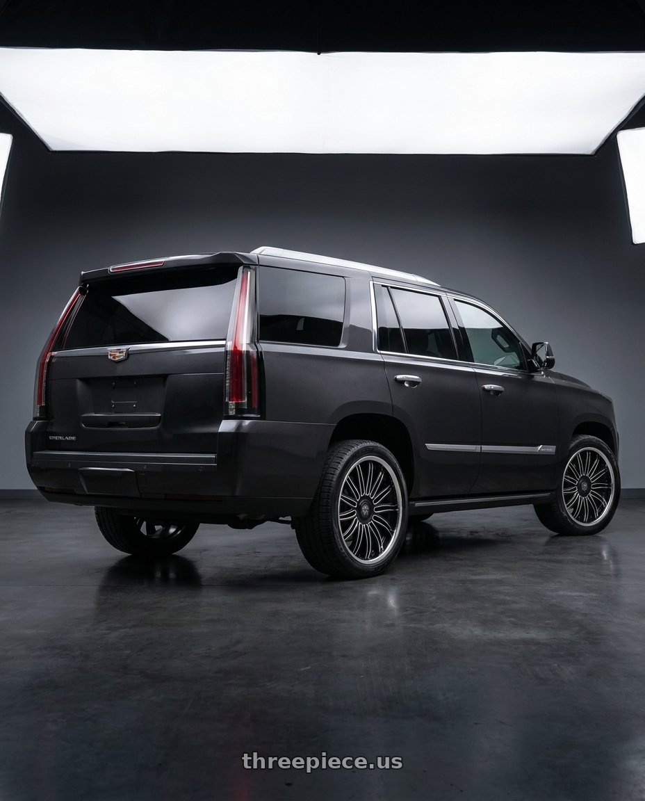 2017 Cadillac Escalade with MASSIV 928 5x112/5x114.3 24x9 +30 BLACK MILLED STAINLESS LIP wheels rear three quarter view square tires