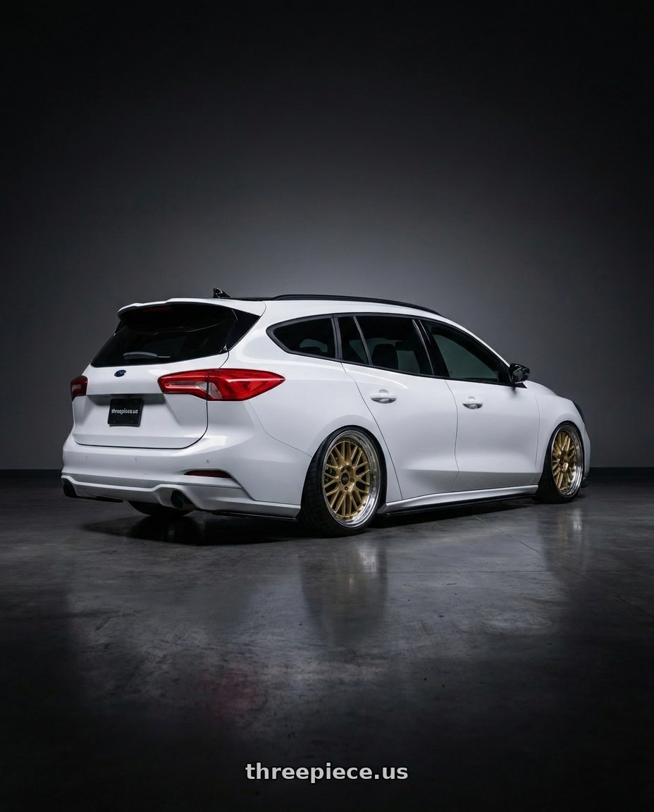 2020 ford focus st wagon with BBS LM 5x112 19x9.0+42 Gold wheels rear three quarter view square tires