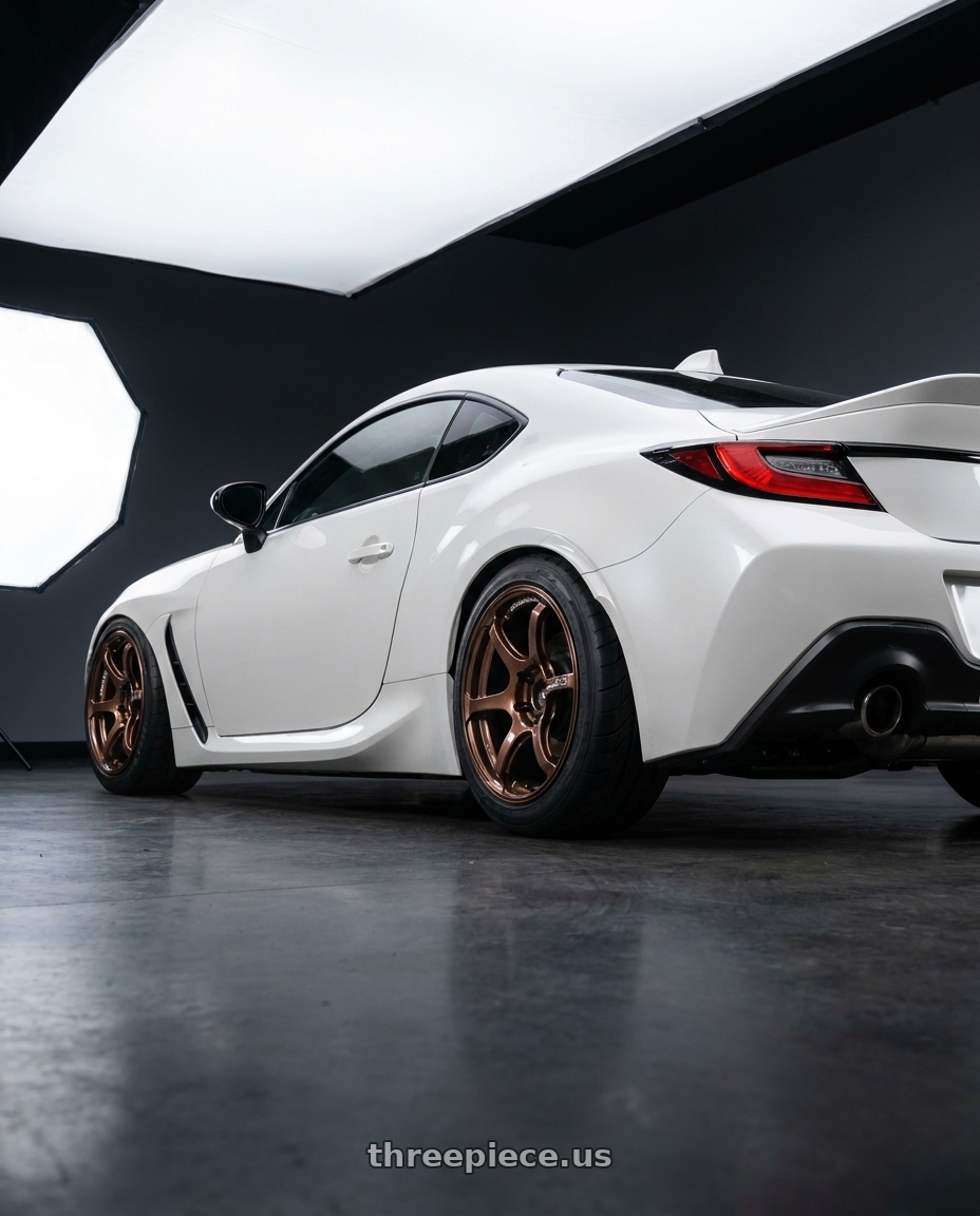 2022 Toyota GR86 with Advan Racing RG-4 5x114.3 18x9.5 +35 RACING COPPER BRONZE wheels rear three quarter view meaty tires