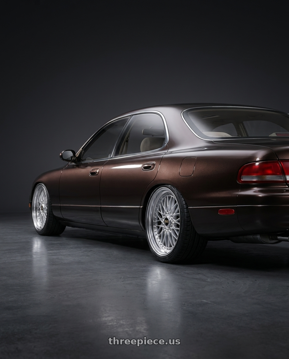 1992 mazda 929 with BBS Super 5x112 19x10 +40 Diamond Silver wheels rear three quarter view slight stretch tires