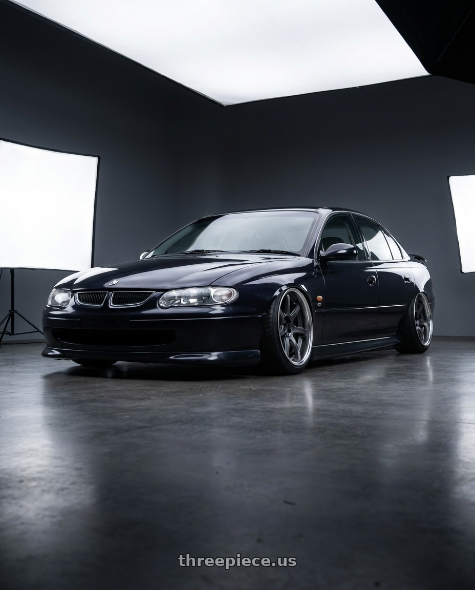 1997 holden vt commodore raven with Work T7r 2P 5x120 19x11.5 +22 Matte Gunmetal wheels