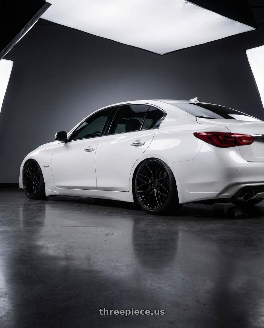 2020 Infiniti Q50 with Avant Garde Wheels M520R 5X114.3 20x9 +32 Gloss Black wheels rear three quarter view slight stretch tires