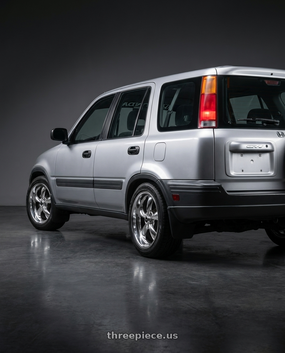 2000 Honda crv with American Racing AR605 TORQ THRUST M 5X114.3 17X7.5 +45 CHROME wheels rear three quarter view slight stretch tires