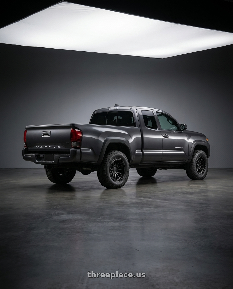 2021 TOYOTA TACOMA with fifteen52 RANGE HD 6x139.7 17x8.5 +0 ASPHALT BLACK (SATIN BLACK) wheels rear three quarter view square tires
