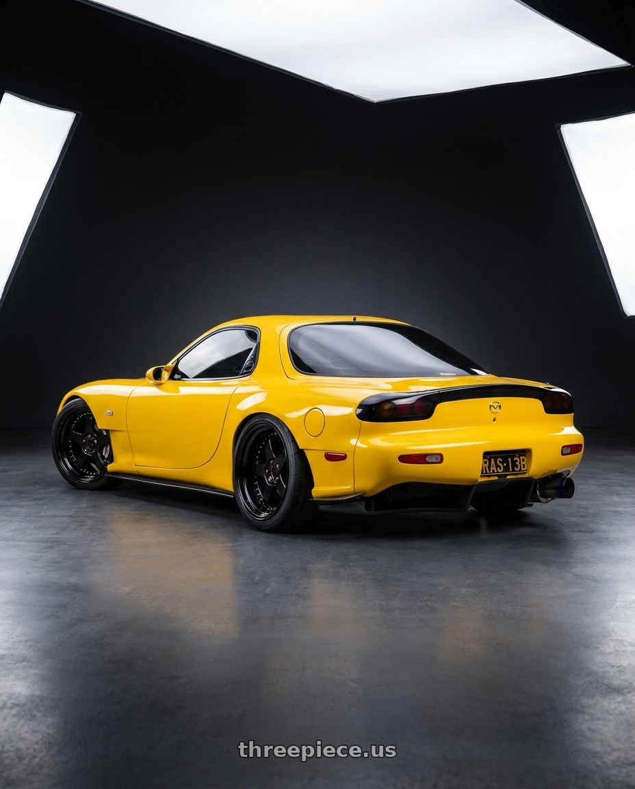 1993 Mazda RX7 with Work Gran Seeker Ccx 5x100 20x11+-7 A Disk Black wheels rear three quarter view extreme stretch tires