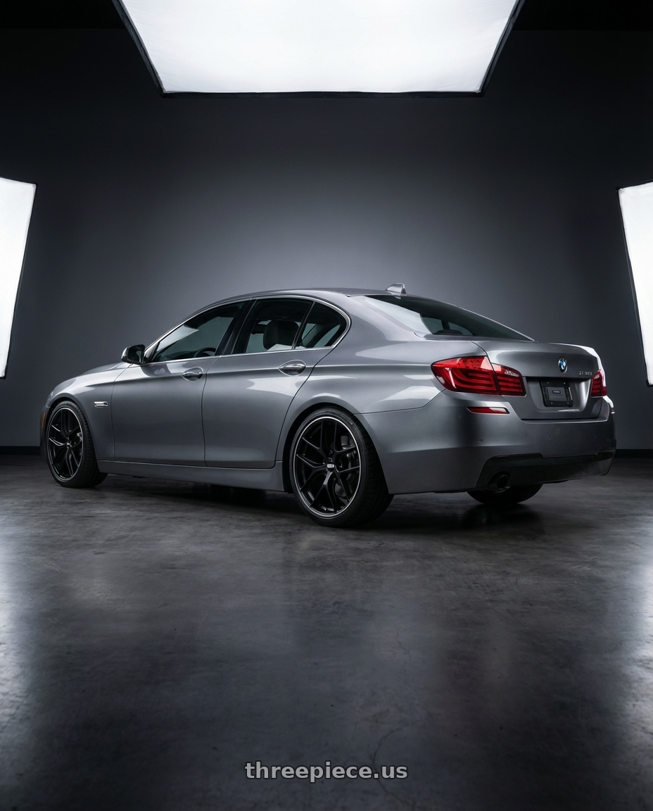 2016 BMW 5 Series F10 with BBS CC-R 5x120 19x9.0+26 Satin Black wheels rear three quarter view square tires