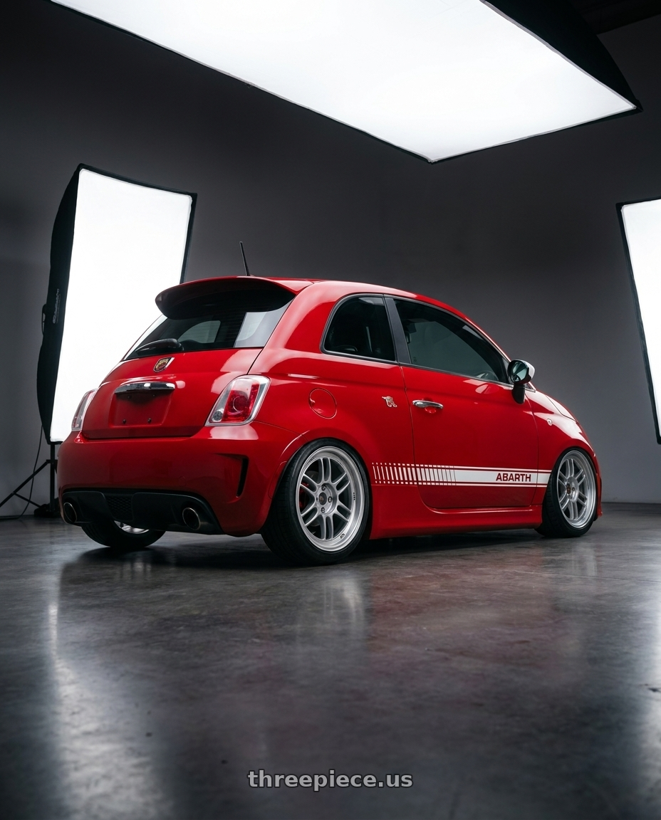 2015 Abarth 595 compitiozone with Enkei RPF1 4x100 17x7+35 Silver wheels rear three quarter view slight stretch tires