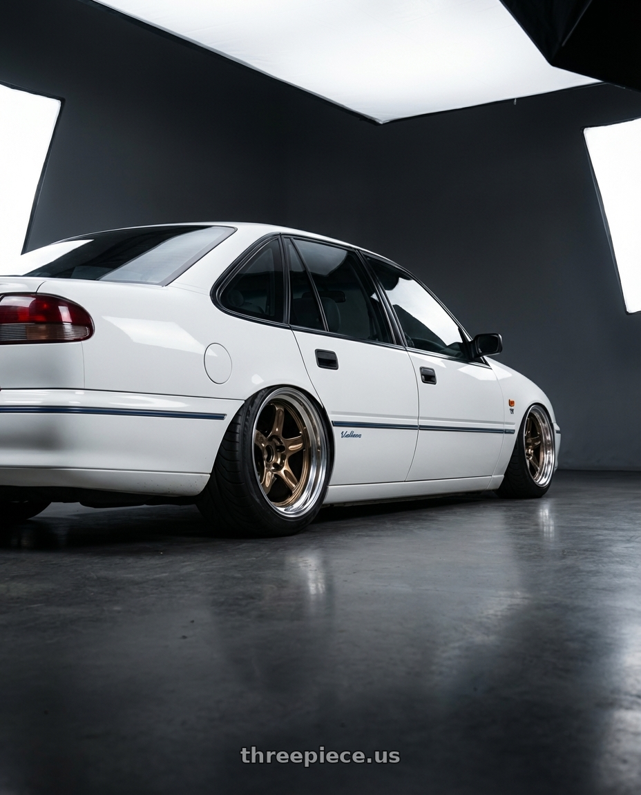 1996 Holden commodore  with Volk Racing 21C SPEC-SR 5x114.3 18x10.5 +15 SHINING BRONZE METAL / RIM DC wheels rear three quarter view meaty tires