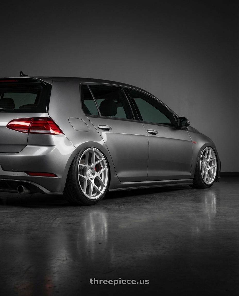2019 Volkswagen GTI MK7 with Aodhan AFF2 5x112 19x8.5+35 Gloss Silver Machined Face wheels rear three quarter view slight stretch tires