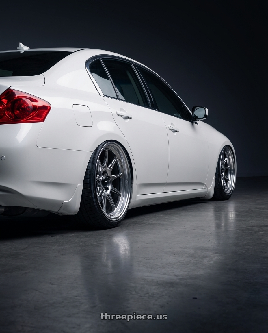 2012 Infiniti G37 with Konig Countergram 5x114.3 19x10+25 Hyper Chrome / Machined Lip wheels rear three quarter view slight stretch tires