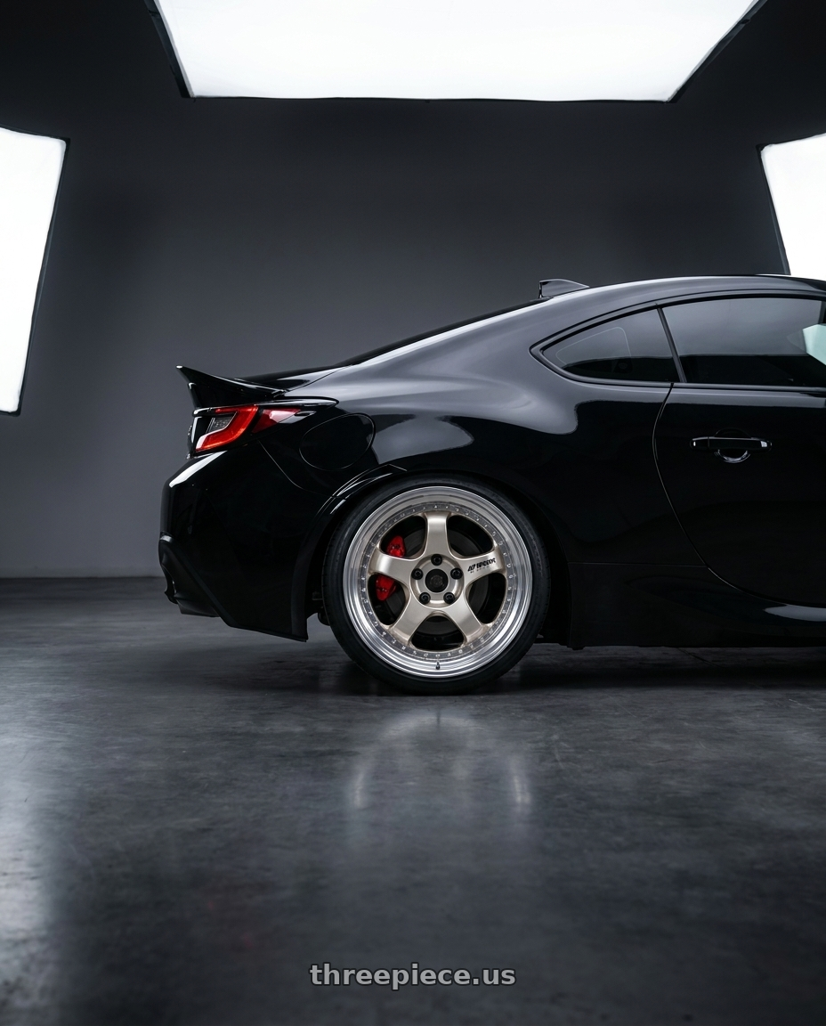 2024 toyota gr86 performance package with Work Meister S1 3P 5x100 18x8.5+41 A Disk Bright Buff Finish wheels rear three quarter view slight stretch tires