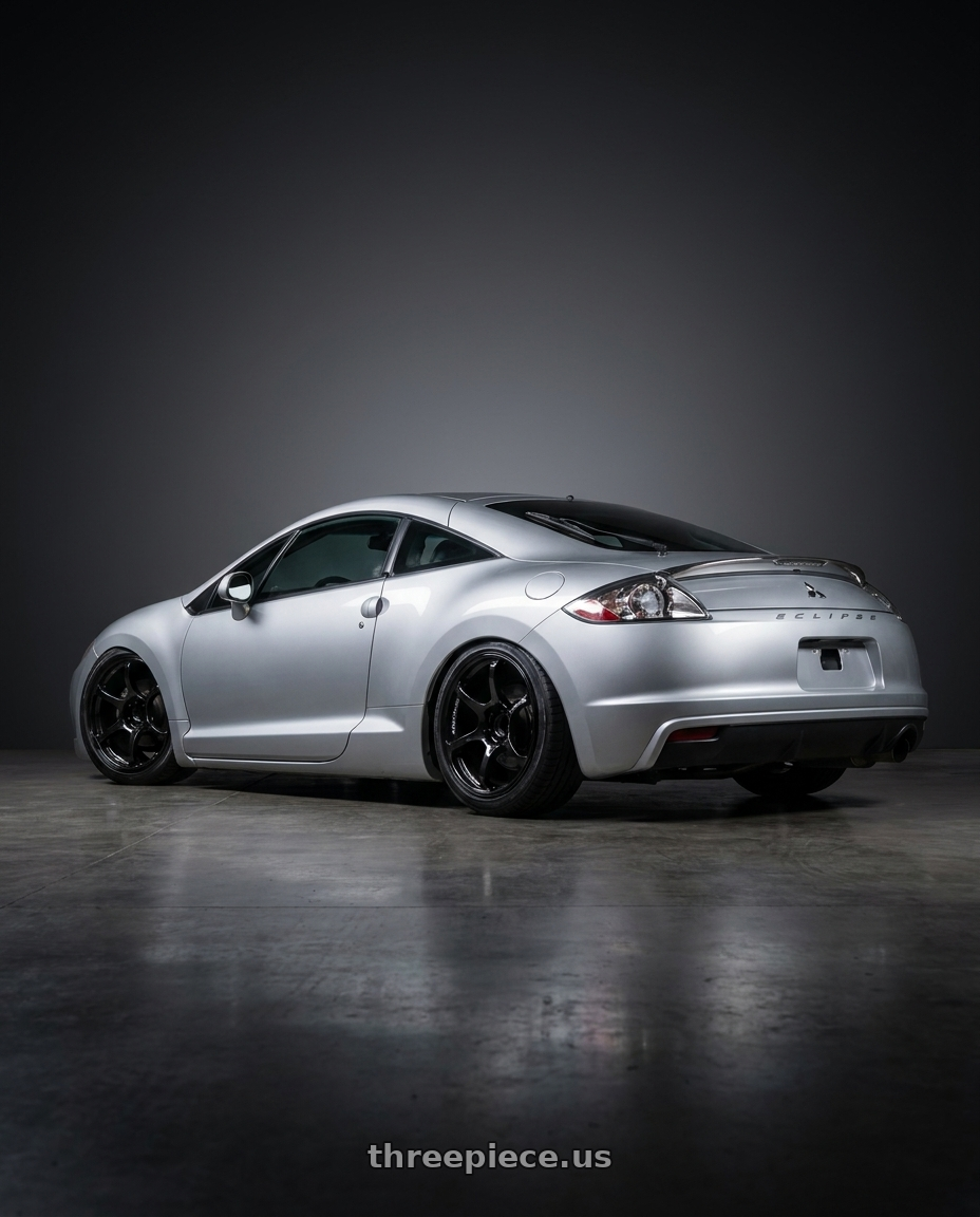 2010 Mitsubishi Eclipse with Advan RGII 5x114.3 19x10+35 Gloss Black wheels rear three quarter view slight stretch tires