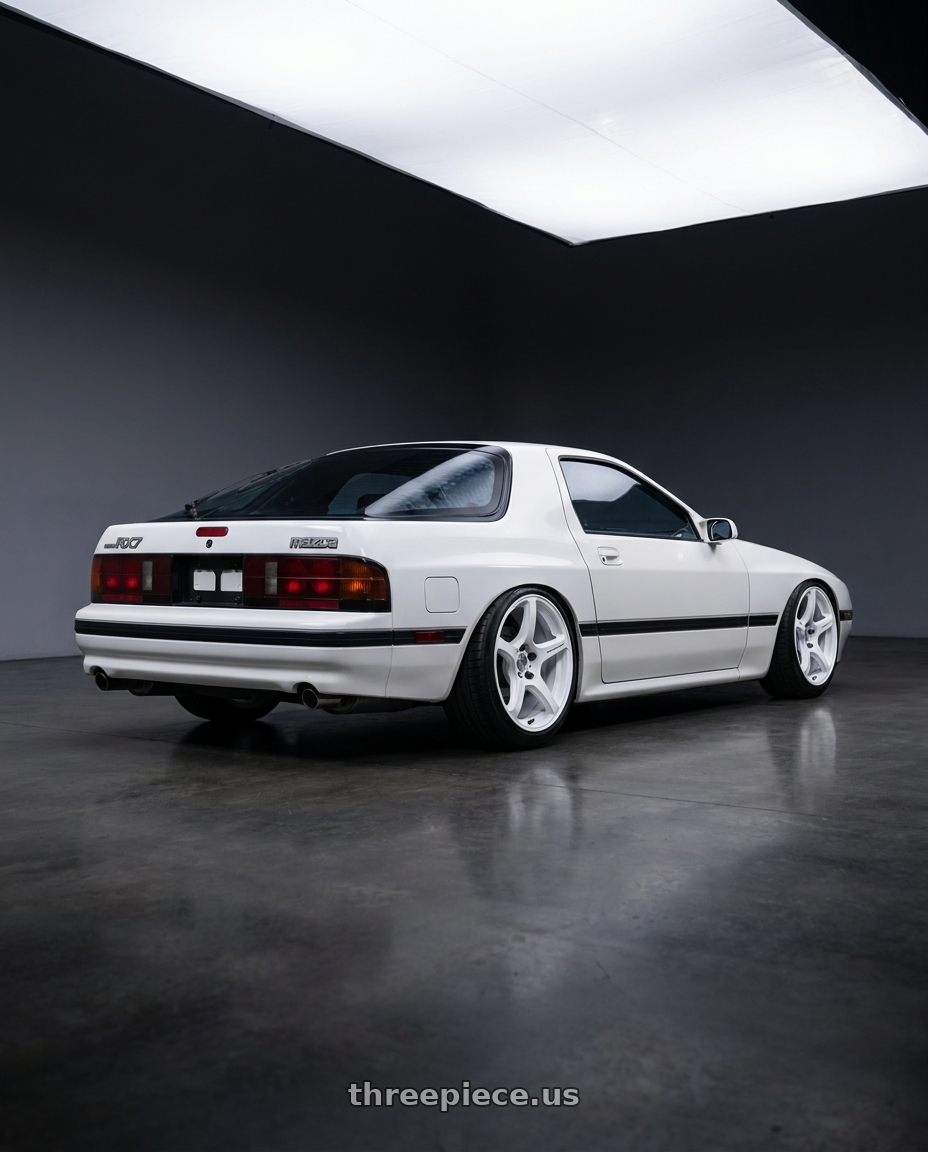 1988 MAZDA RX7 SE Candy with Work Emotion T5r 5x114.3 17x9 +22 Ice White wheels rear three quarter view slight stretch tires