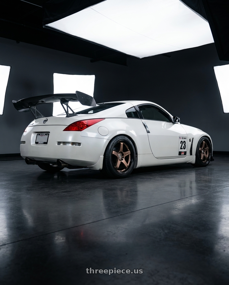 2007 nissan 350z with Spec-1 SPT-31 blank 4x/5x 18x9.5 +42 Matte Bronze & Black Lip wheels rear three quarter view slight stretch tires