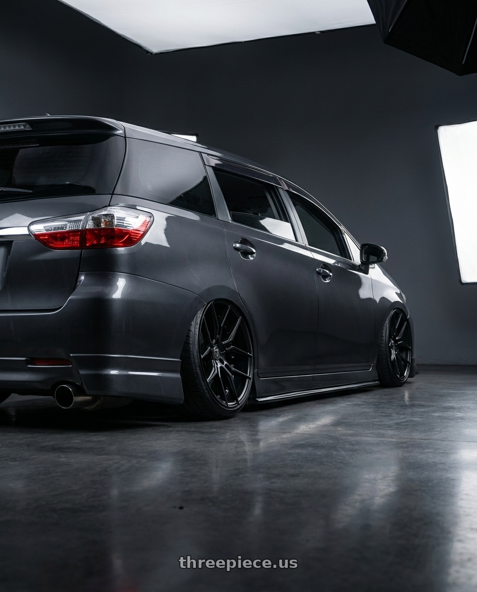 2010 TOYOTA WISH with MARQUEE WHEELS M1000 5x114.3 20x9+33 SATIN BLACK wheels rear three quarter view extreme stretch tires