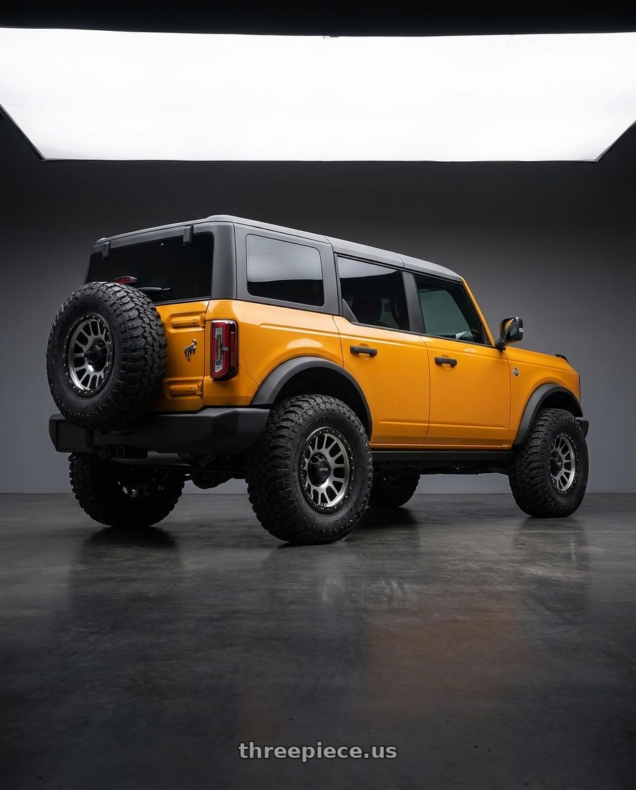 2024 Ford Bronco with Vision Off-Road 111 Nemesis 6x139.7 17x9-12 Matte Black Machined Face wheels rear three quarter view meaty tires