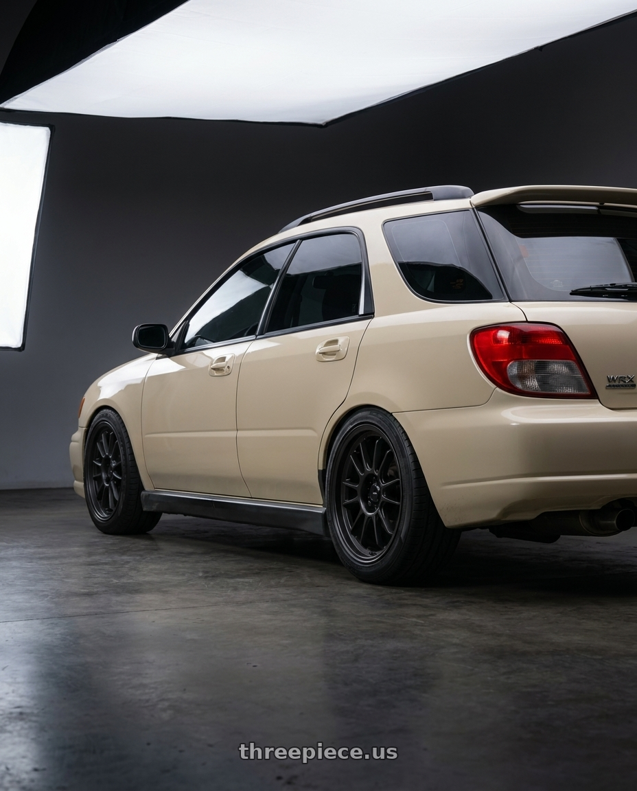 2002 subaru wrx wagon with Konig Hypergram 5x100 17x8+40 Matte Black wheels rear three quarter view slight stretch tires