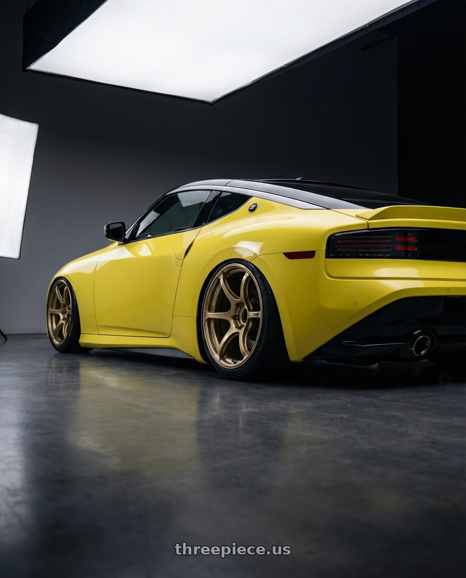 2024 Nissan Z with Advan RGIII 5x114.3 19x9.0+35 Gold wheels rear three quarter view slight stretch tires
