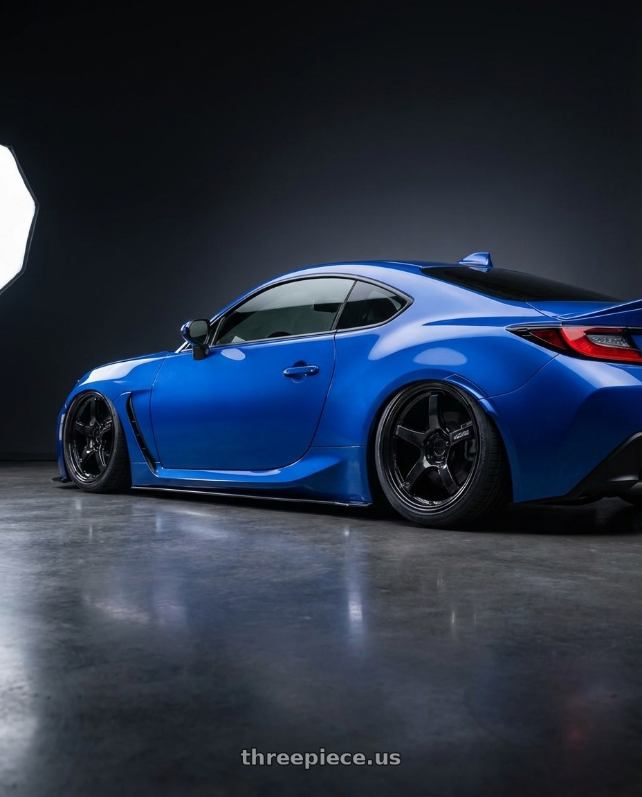 2024 Subaru BRZ with Gram Lights 57CR 5x114.3 18x8.5+37 Glossy Black wheels rear three quarter view slight stretch tires