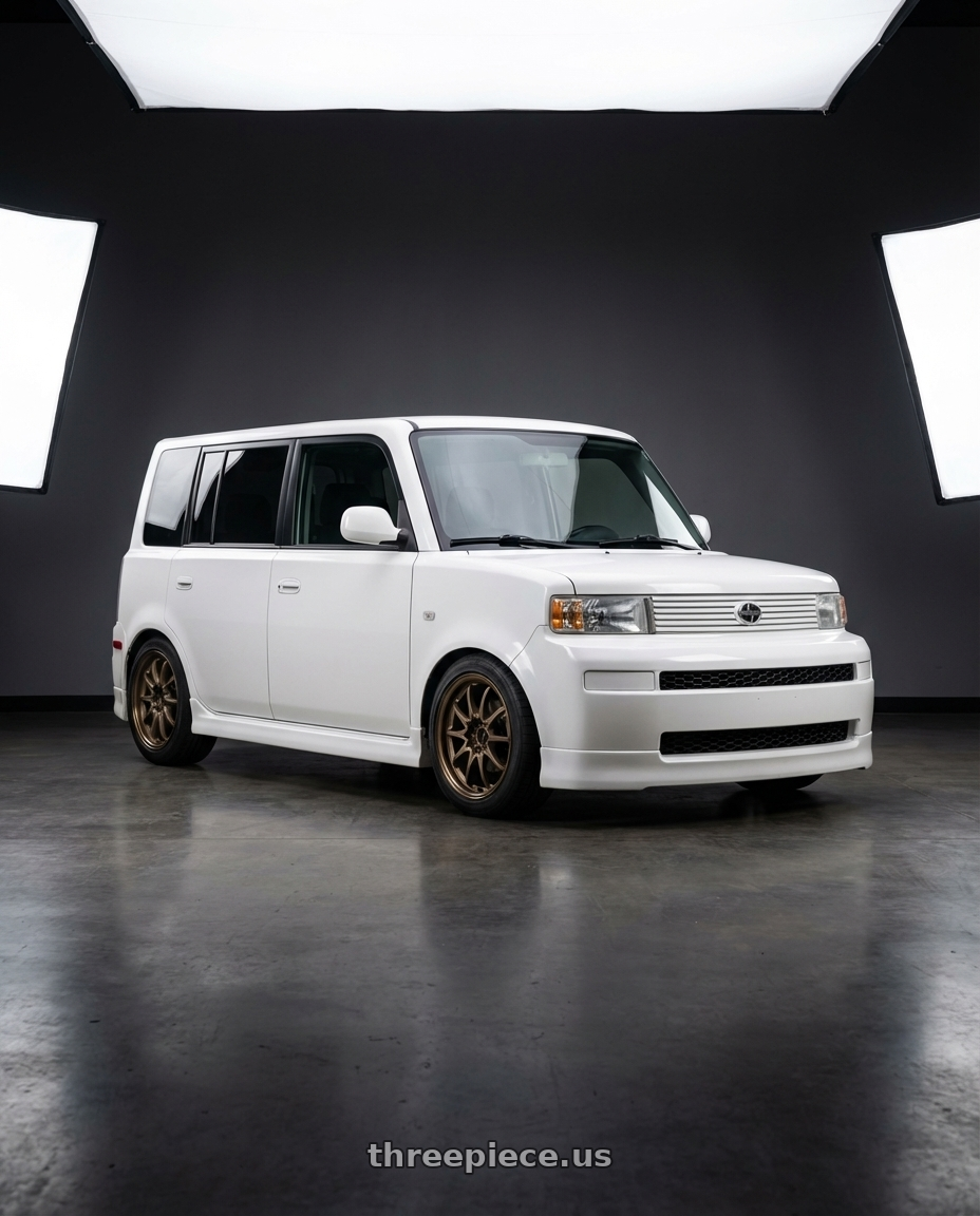 2005 Scion xB with Volk Racing CE28N 5x114.3 18x8.5 +30 BRONZE wheels front three quarter view lowered stance