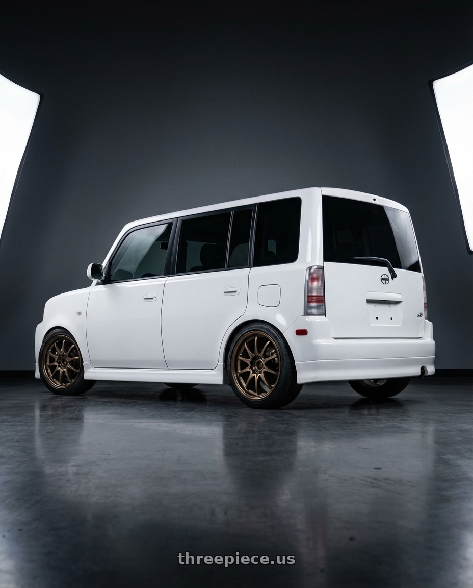 2005 Scion xB with Volk Racing CE28N 5x114.3 18x8.5 +30 BRONZE wheels rear three quarter view square tires