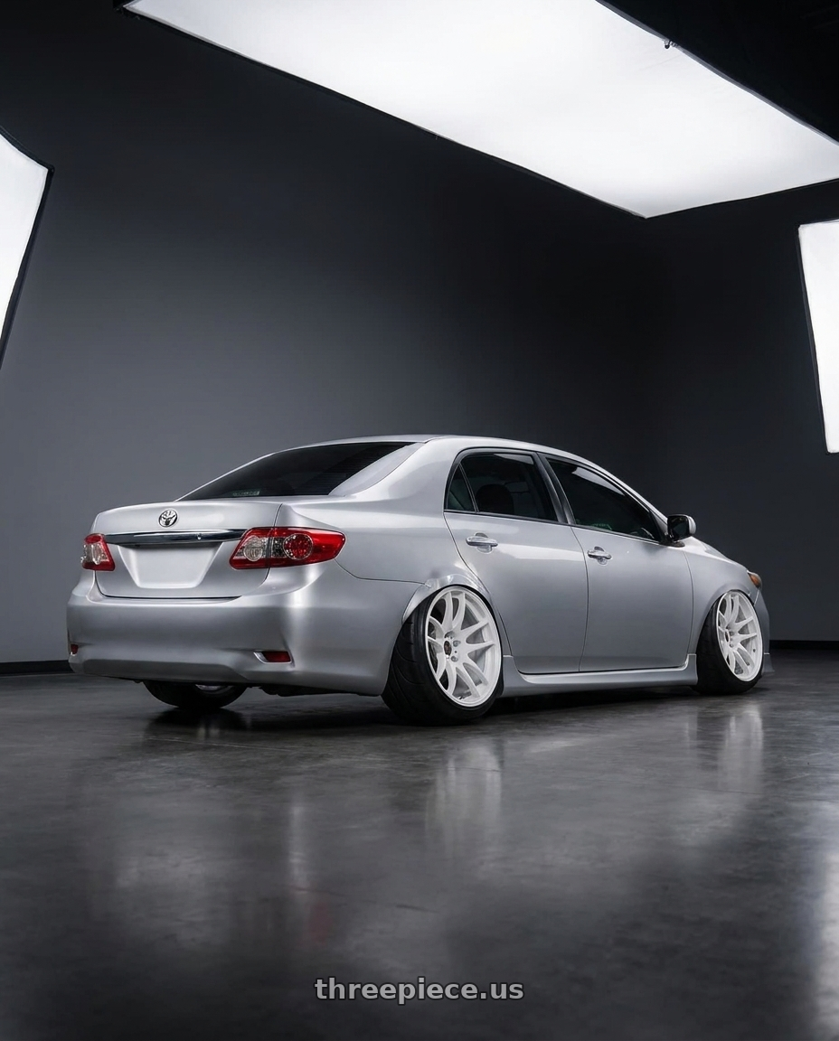 Toyota Corrolla 2013 with Work Emotion CR Kiwami wheels rear three quarter view excessive tires
