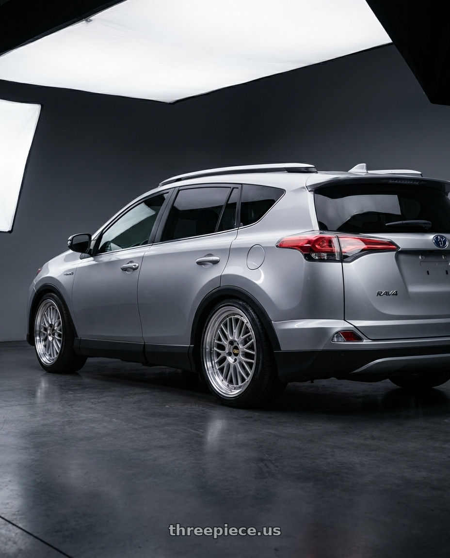 2016 toyota rav4 silver with BBS LM 5x114.3 19x8.5+43 Diamond Silver wheels rear three quarter view slight stretch tires