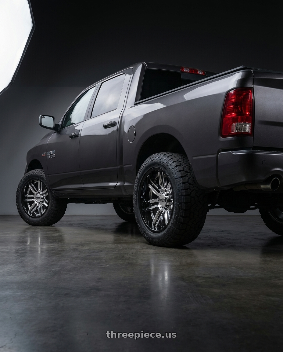 2024 Ram 1500 with Moto Metal MO202 6X139.7 22X10 -18 CHROME CENTER GLOSS BLACK MILLED LIP wheels rear three quarter view meaty tires