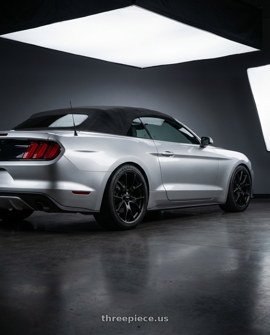 2018 ford mustang with Voxx Replica 50ANN 5x115 20x10.5+25 Matte Black wheels rear three quarter view square tires