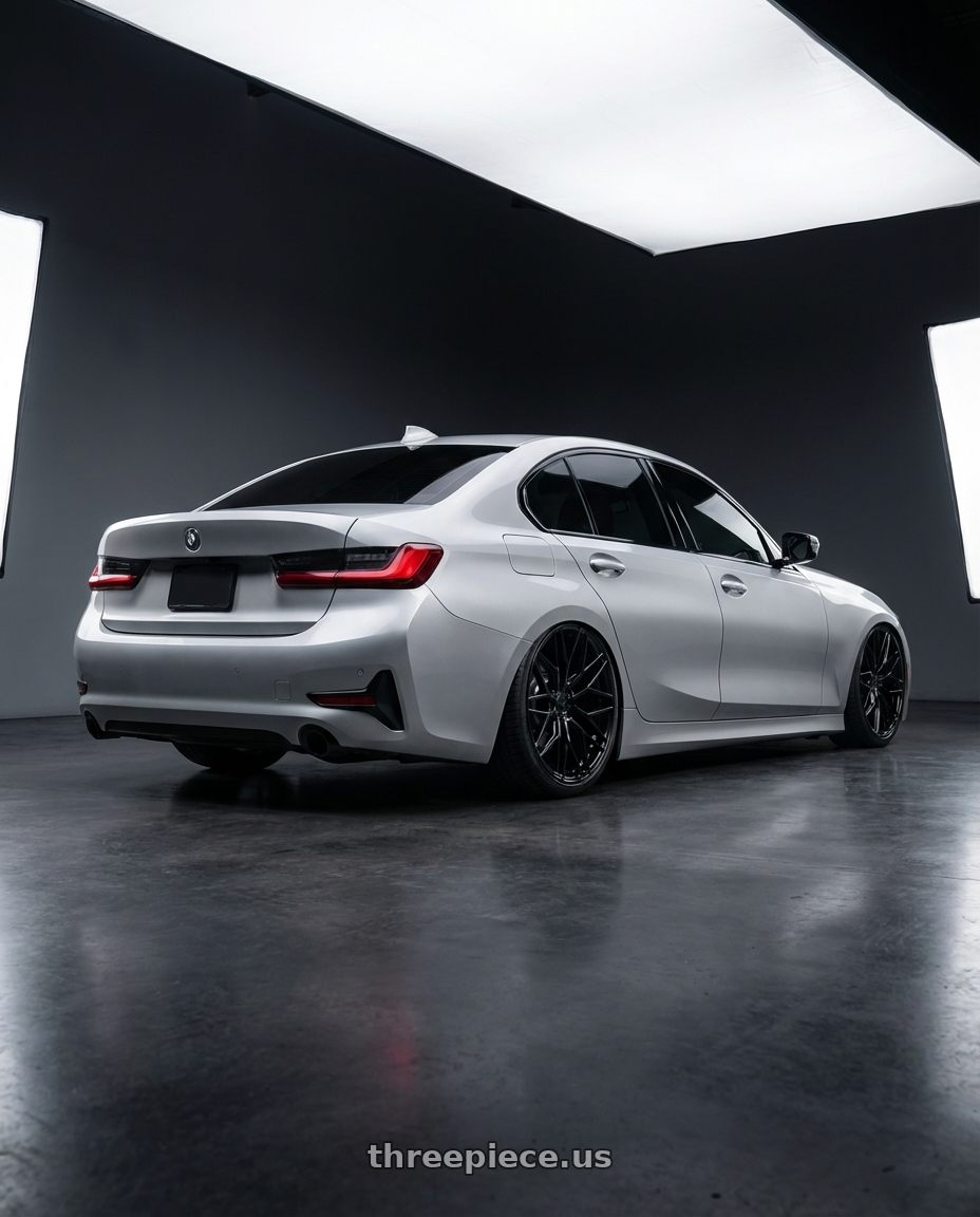 2023 BMW 3 Series G20 with Avant Garde Wheels M520R 5X112 19x9.5 +40 Gloss Black wheels rear three quarter view slight stretch tires