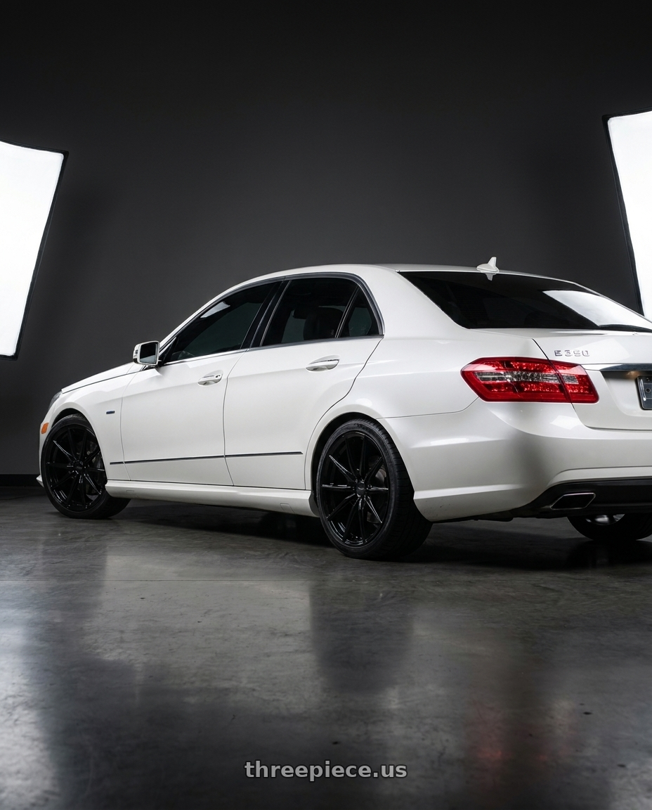 2012 Mercedes-Benz E350 with Petrol P4B 5X112 19X8 +40 GLOSS BLACK wheels rear three quarter view square tires