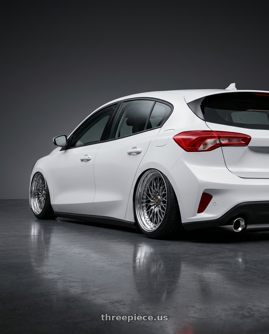 2020 Ford focus with Work Vs-Xv 5x100 18x7+28 A Disk Brilliant Silver Black wheels rear three quarter view slight stretch tires