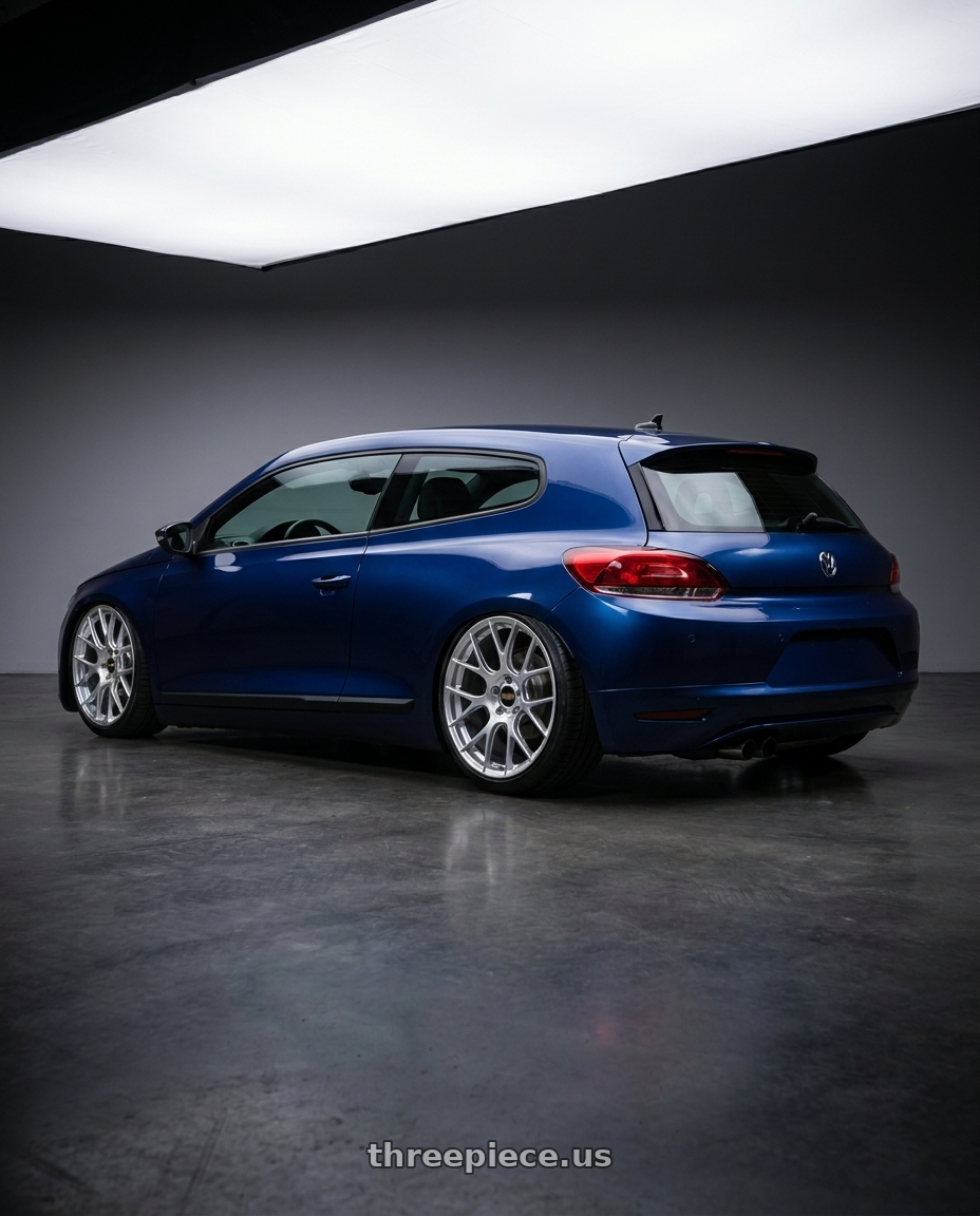 2011 Volkswagen scirocco 20 with BBS RE-V7 5x120 19x8.5 +35 Diamond Silver wheels rear three quarter view slight stretch tires