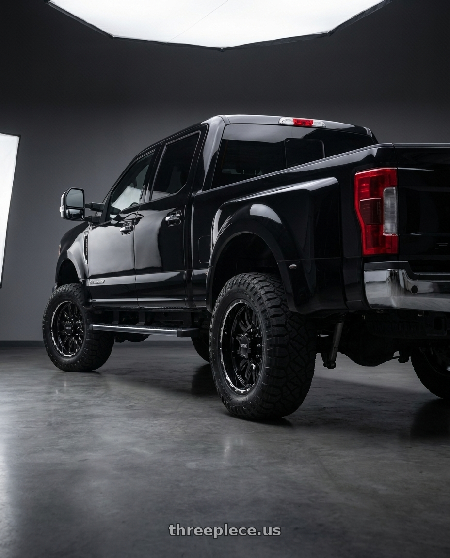 2017 Ford F350 with WELD Off-Road Gauntlet 8x170 20x10 -18 Gloss Black/Milled wheels rear three quarter view square tires