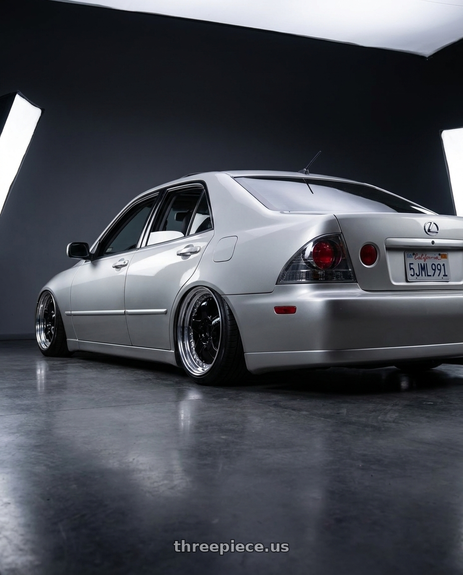 2004 lexus is300 with Work Meister S1 3P 5x114.3 17x8.5+42 W Disk Black wheels rear three quarter view slight stretch tires