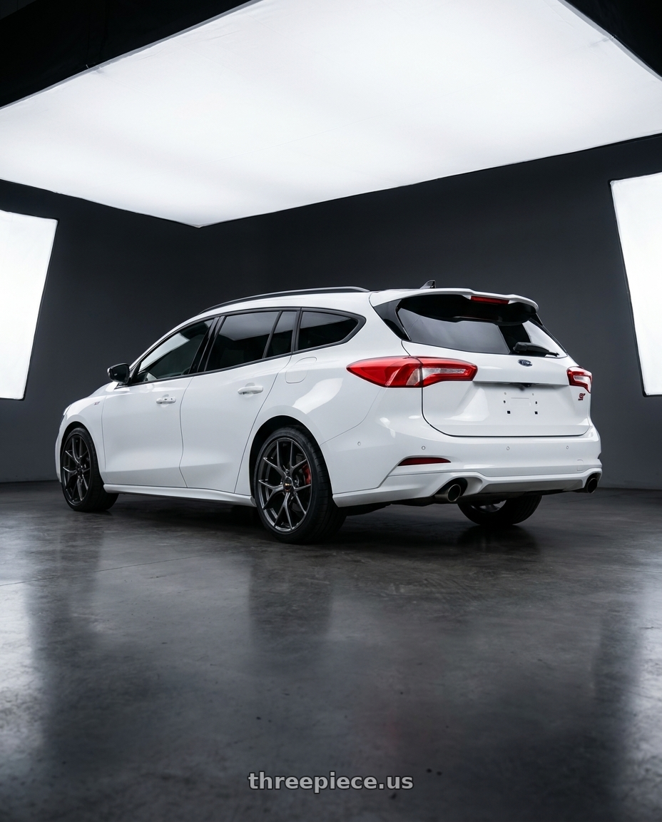 2023 focus st wagon white with BBS RE-V7 5x112 19x8.5 +43 Diamond Black wheels rear three quarter view square tires