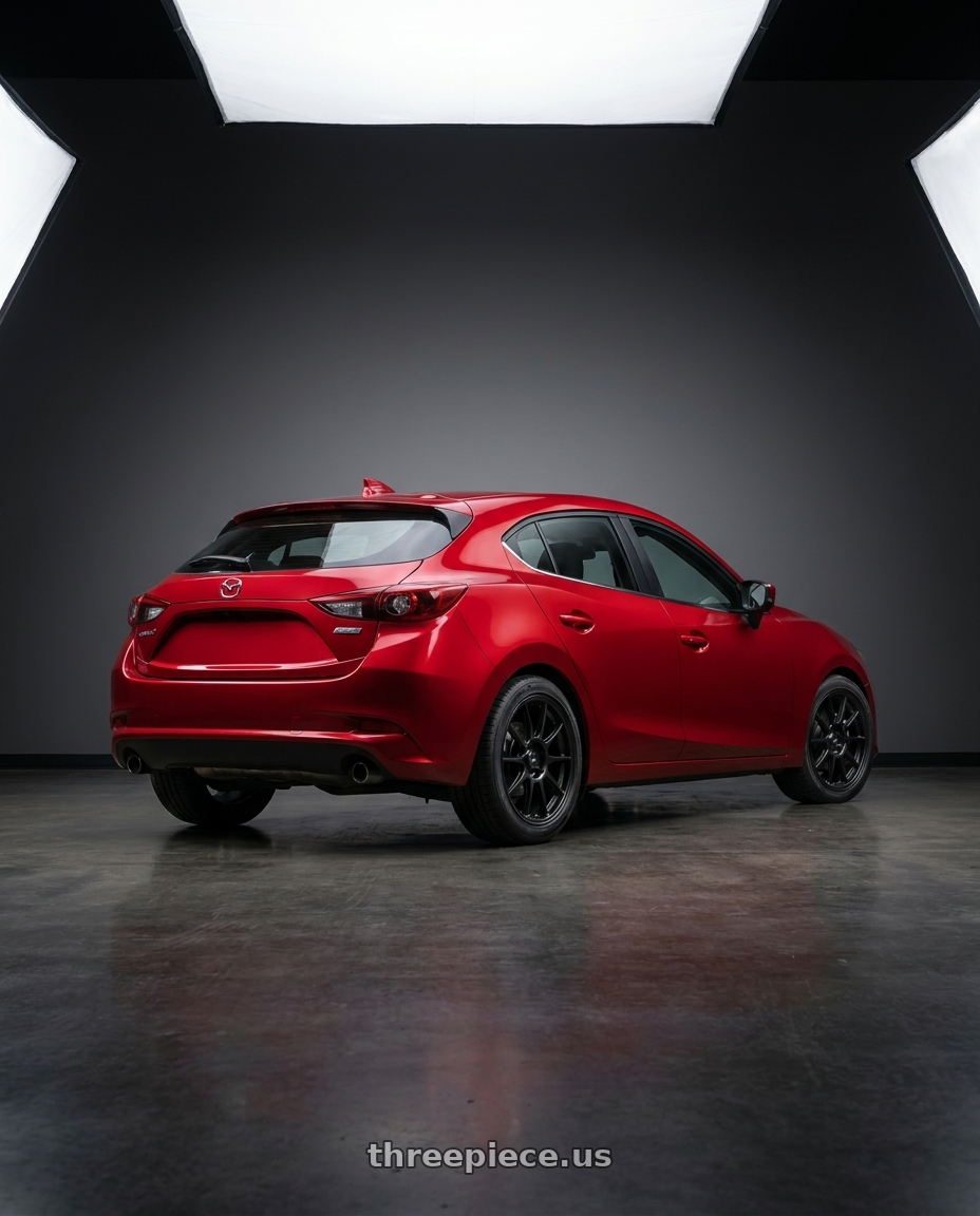 2018 Mazda 3 with Konig 57B Dekagram 5x114.3 18x8.5 +45 Semi-matte Black wheels rear three quarter view square tires