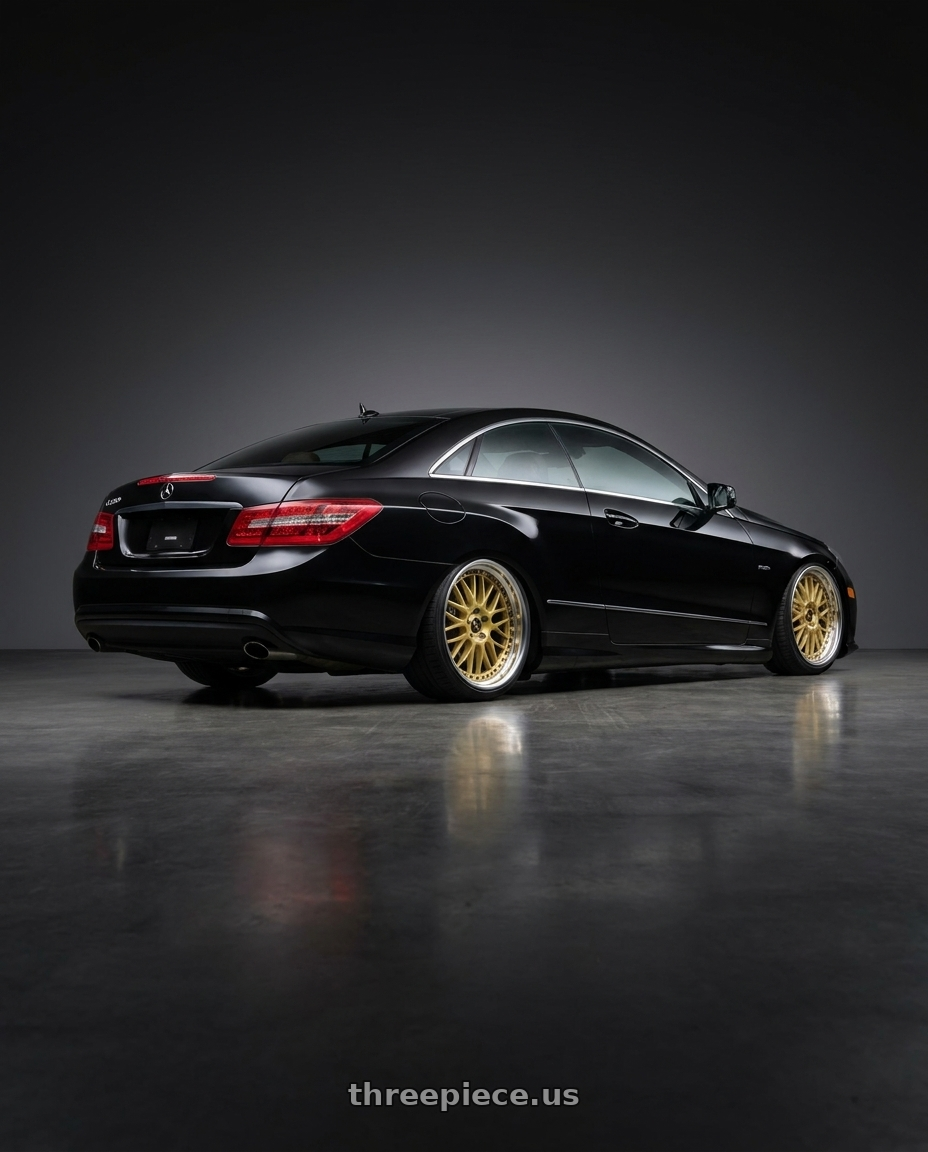 2013 Mercedes-Benz E350 4Matic with Work Vs-Xx 5x112 18x8+34 R Disk Gold wheels rear three quarter view square tires